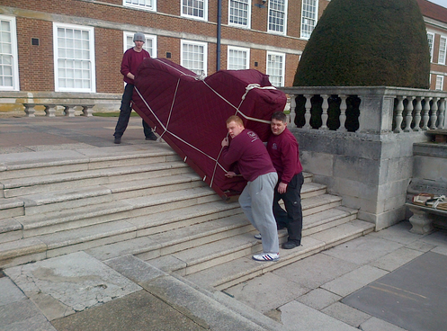 Professional piano movers are likely a better choice vs. DIY (if you can afford the services).